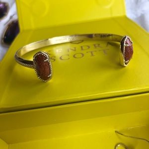 Kendra Scott gold Elton Cuff bracelet in goldstone.